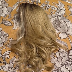 Long wavy Blonde Wig with medium brown roots. Lace top